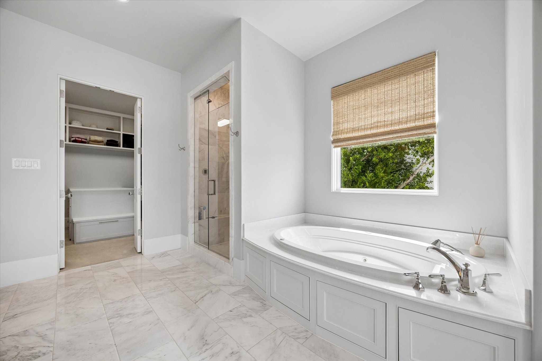 3615 Overbrook Lane Houston, TX 77027 - Photo 24 of 34 a bathroom with a granite countertop sink and a bathtub