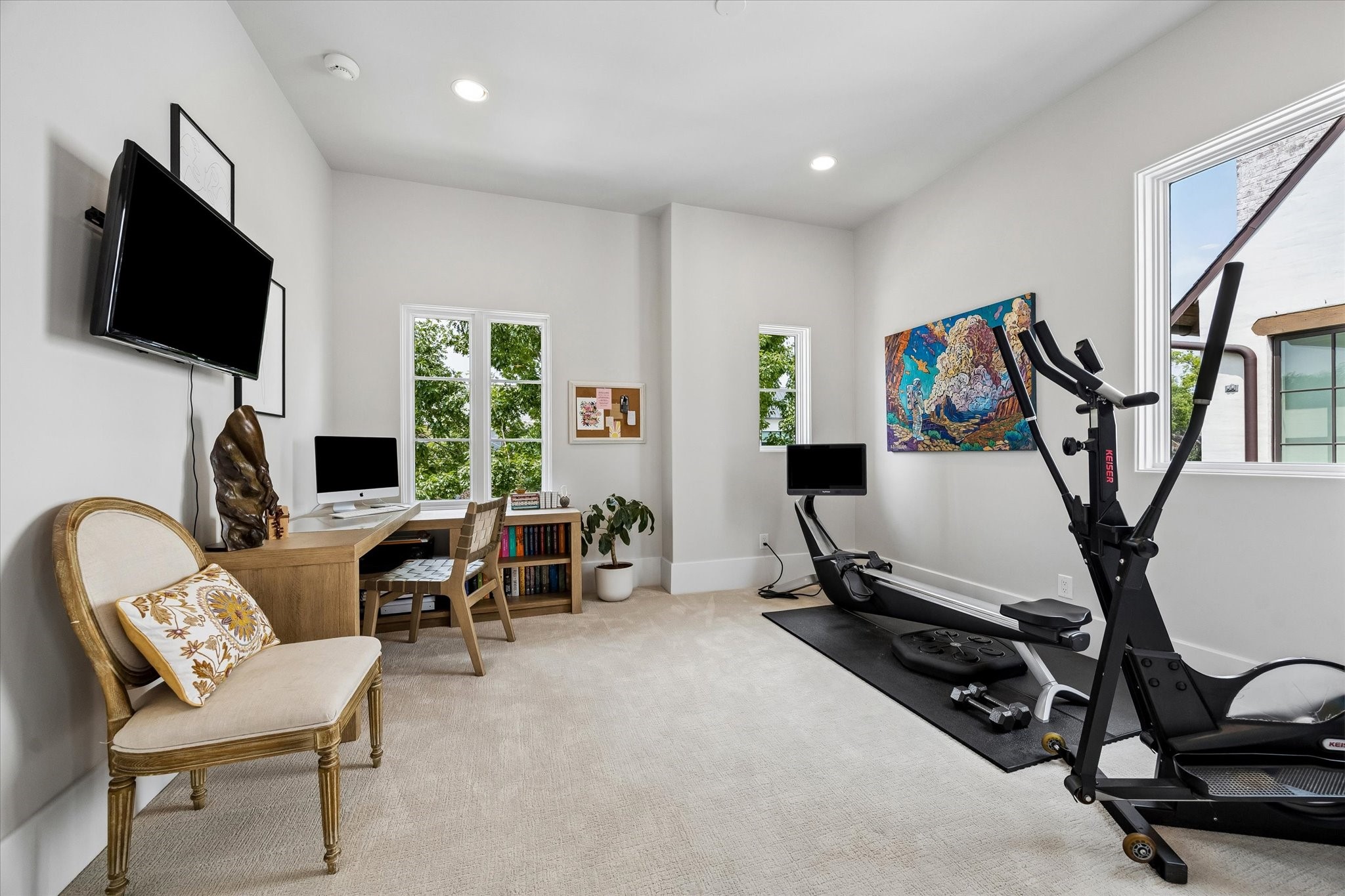 3615 Overbrook Lane Houston, TX 77027 - Photo 26 of 34 a view of a livingroom with furniture and a flat screen tv