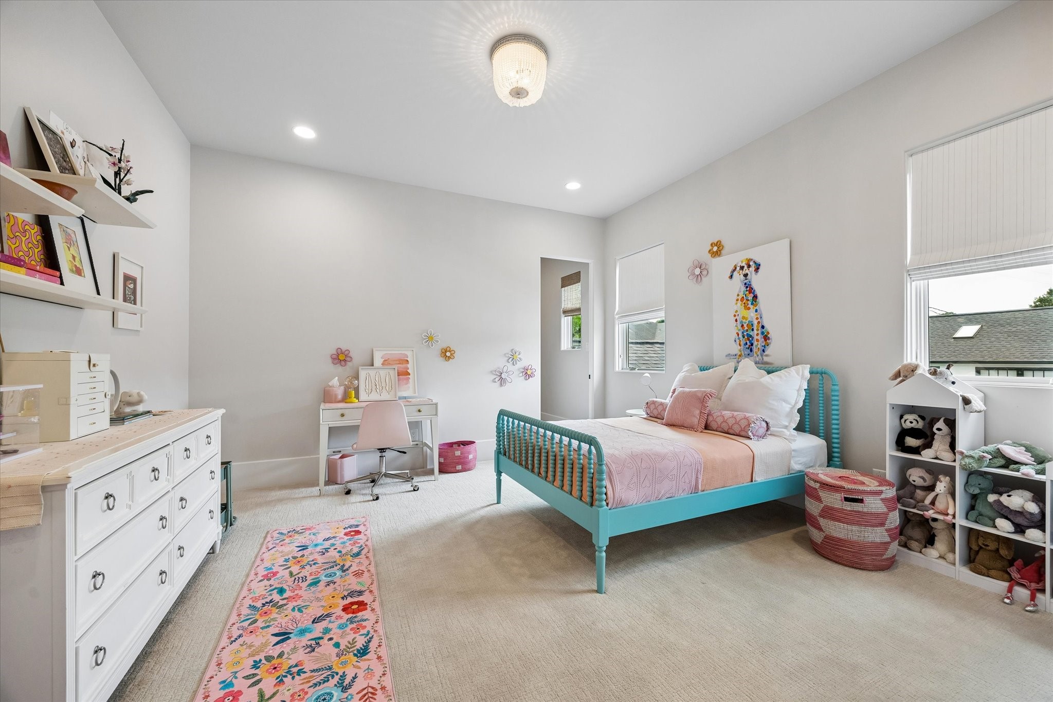 3615 Overbrook Lane Houston, TX 77027 - Photo 30 of 34 a bedroom with furniture and a baby crib