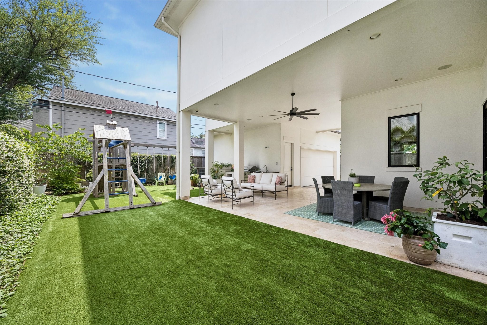 3615 Overbrook Lane Houston, TX 77027 - Photo 5 of 34 a view of a house with backyard and sitting area