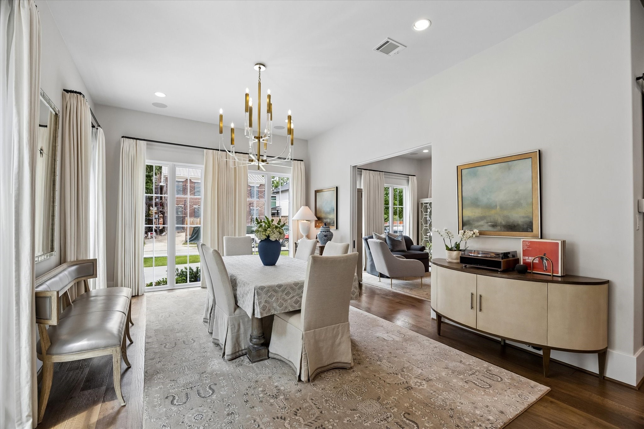 3615 Overbrook Lane Houston, TX 77027 - Photo 7 of 34 a view of a dining room with furniture window and wooden floor