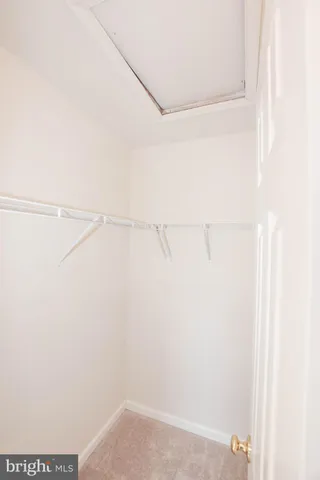 a view of small space with racks on the wall