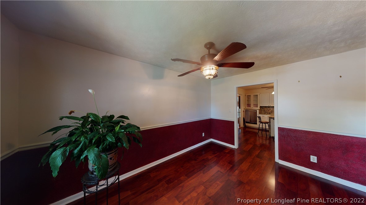 2678 County Line Road St. Pauls, NC 28384 - Photo 8 of 36 a living room with furniture and a potted plant