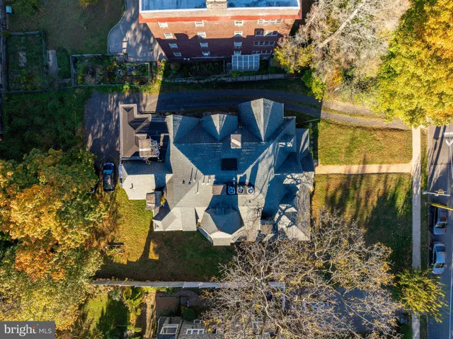 a view of swimming pool with sitting area