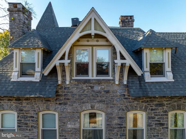 a view of entryway with wooden stairs