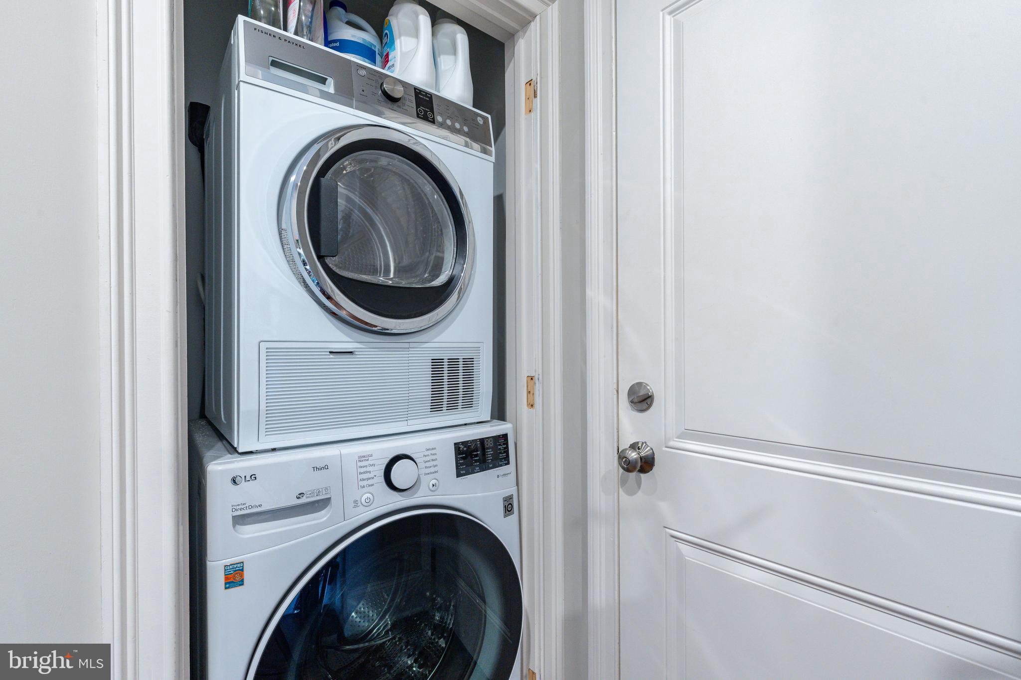 109-15 Carpenter Lane Philadelphia, PA 19119 - Photo 33 of 47 a utility room with dryer and washer