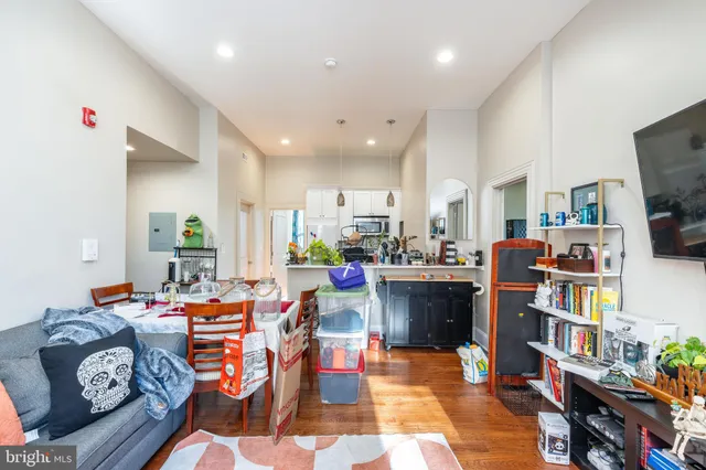 a bathroom with a sink mirror and a bathtub