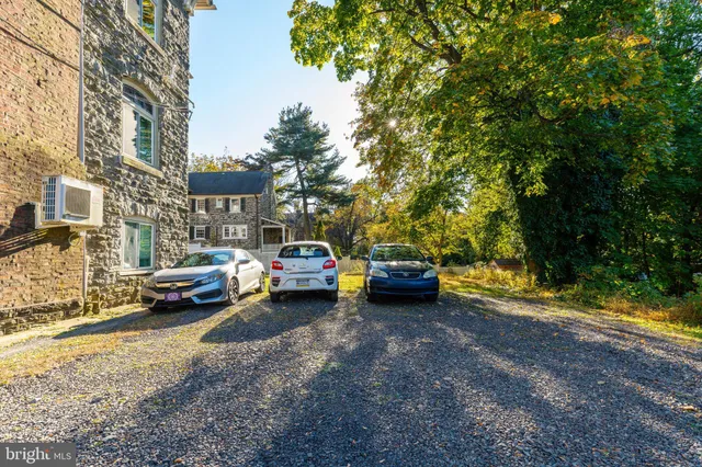 a view of street with parked cars