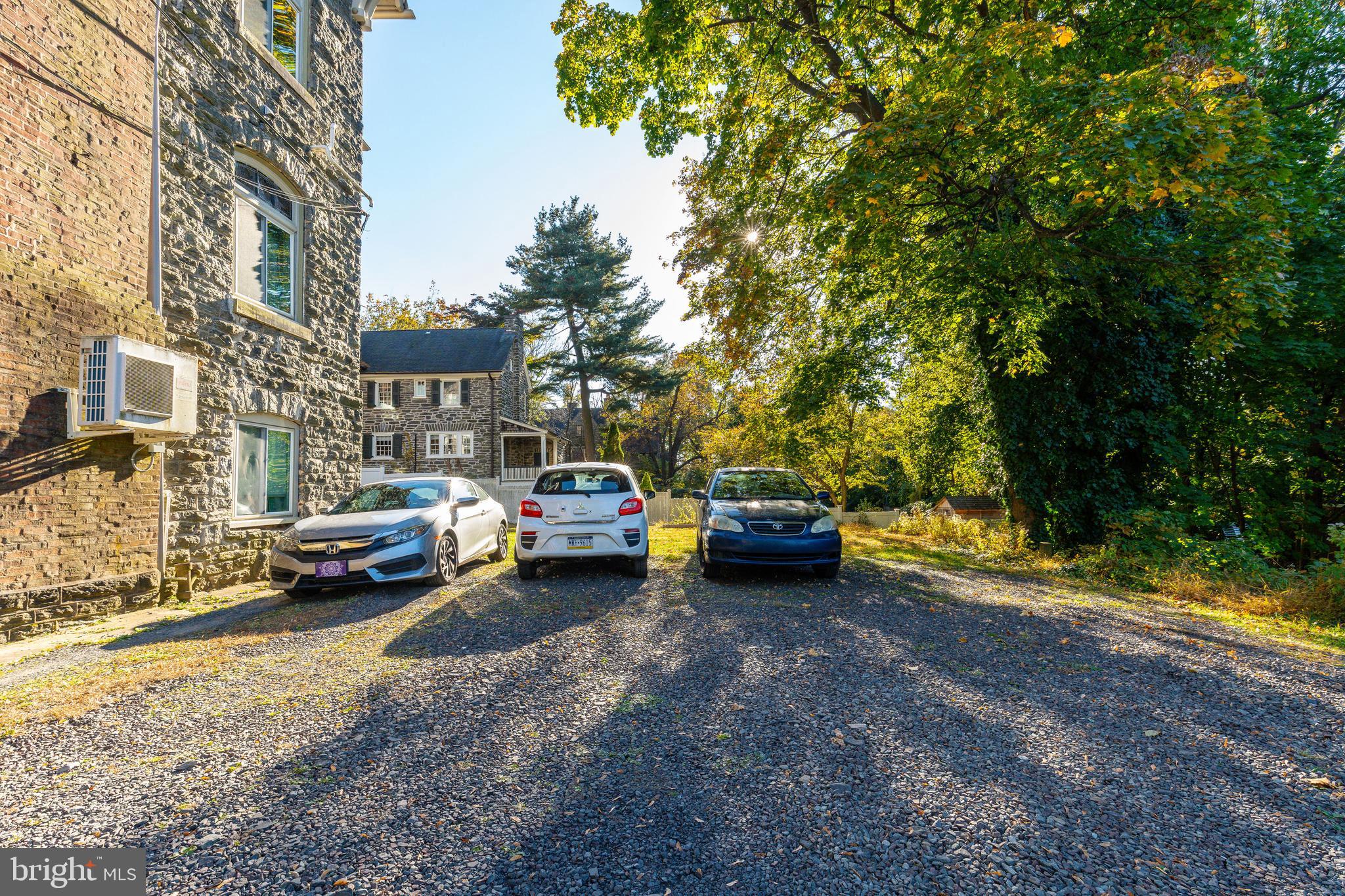 109-15 Carpenter Lane Philadelphia, PA 19119 - Photo 6 of 47 a view of street with parked cars