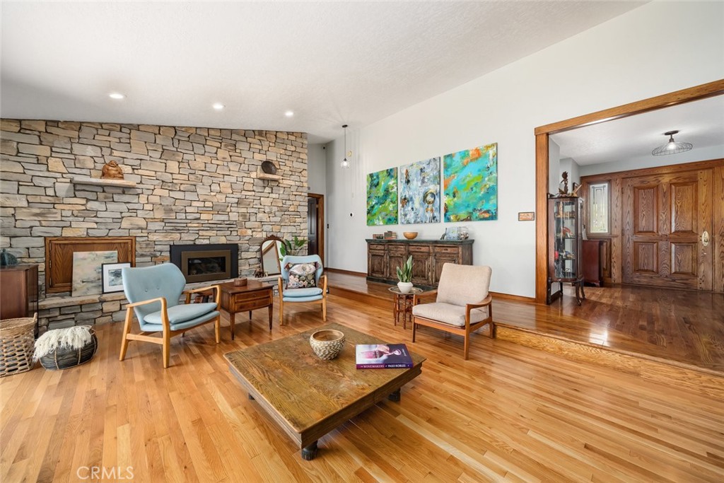 1105 Spanish Camp Road Paso Robles, CA 93446 - Photo 13 of 72 a living room with furniture and a fireplace