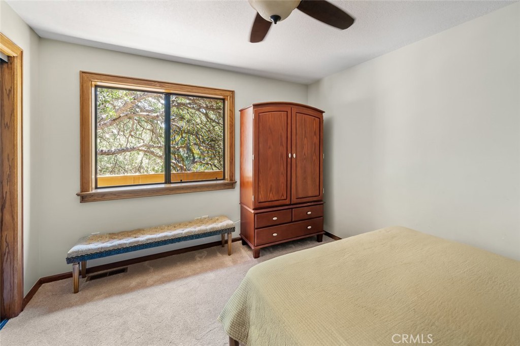 1105 Spanish Camp Road Paso Robles, CA 93446 - Photo 30 of 72 a bedroom with furniture and a window