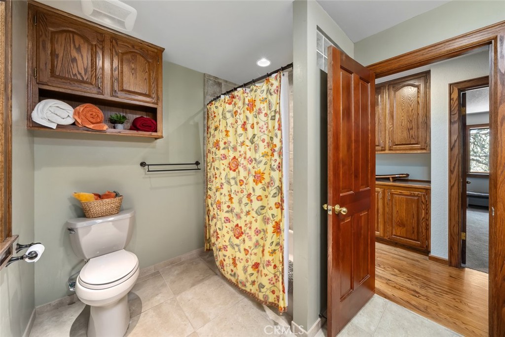 1105 Spanish Camp Road Paso Robles, CA 93446 - Photo 32 of 72 a bathroom with a toilet sink and shower