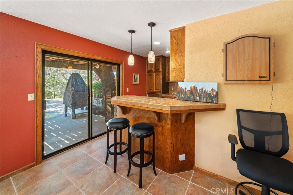 1105 Spanish Camp Road Paso Robles, CA 93446 - Photo 44 of 72 a dining room with furniture and a window