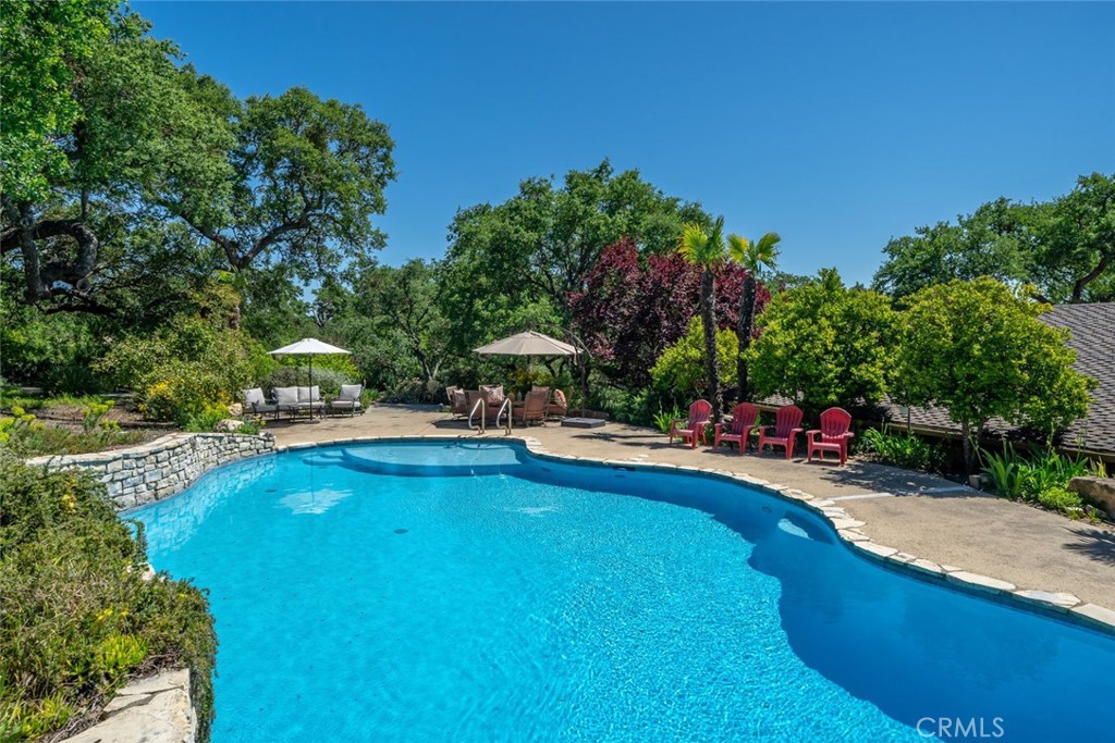 1105 Spanish Camp Road Paso Robles, CA 93446 - Photo 50 of 72 a view of a swimming pool with lounge chair