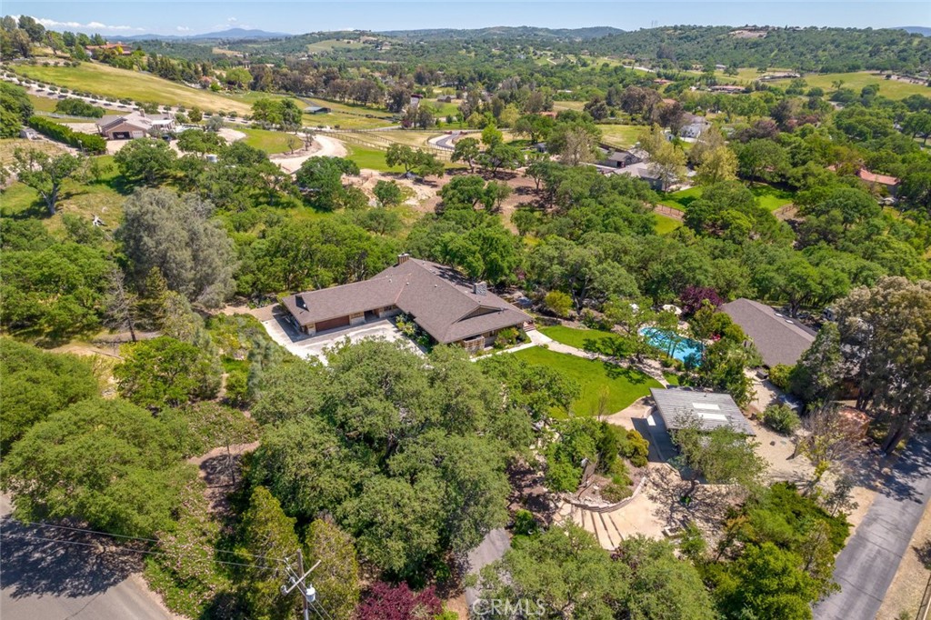 1105 Spanish Camp Road Paso Robles, CA 93446 - Photo 5 of 72 an aerial view of residential houses with outdoor space and trees