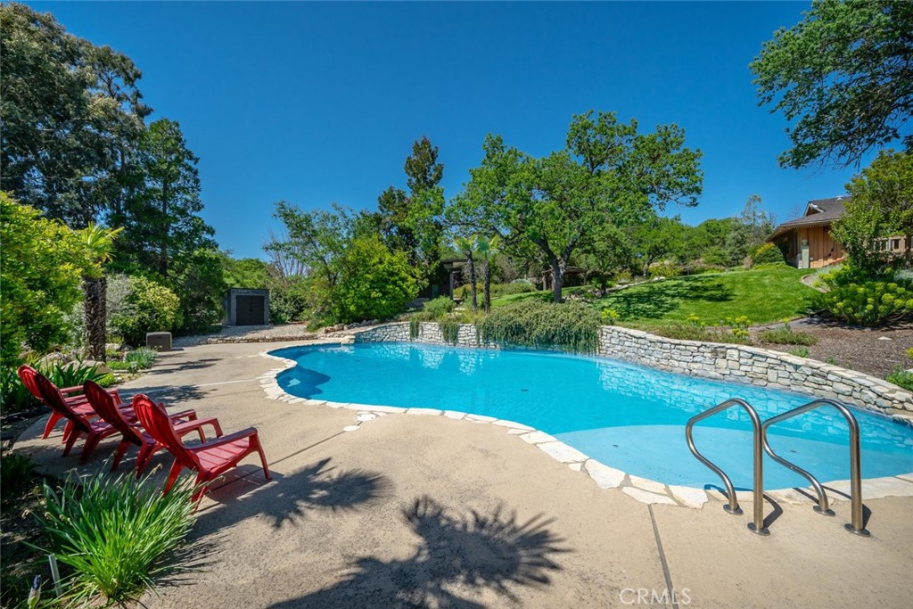 1105 Spanish Camp Road Paso Robles, CA 93446 - Photo 56 of 72 a view of a swimming pool with a patio