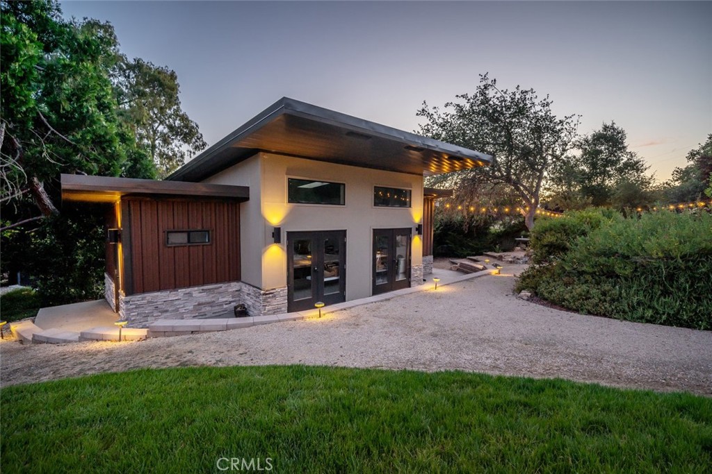 1105 Spanish Camp Road Paso Robles, CA 93446 - Photo 58 of 72 a view of a house with a yard and garage