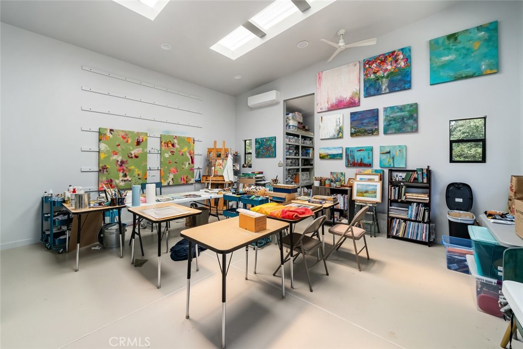 1105 Spanish Camp Road Paso Robles, CA 93446 - Photo 60 of 72 a group of people sitting in a living room