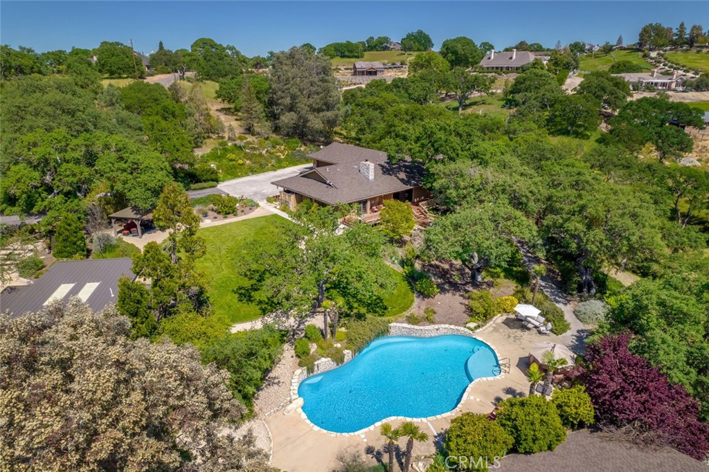 1105 Spanish Camp Road Paso Robles, CA 93446 - Photo 71 of 72 an aerial view of a house with a yard and lake view
