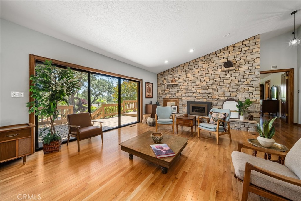 1105 Spanish Camp Road Paso Robles, CA 93446 - Photo 10 of 72 a living room with furniture and a fireplace