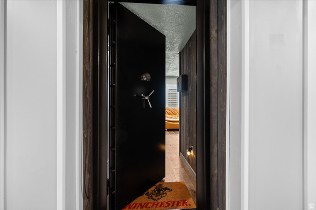 3359 Eurasian Crane Road Clinton, UT 84015 - Photo 48 of 71 Hallway featuring a textured ceiling