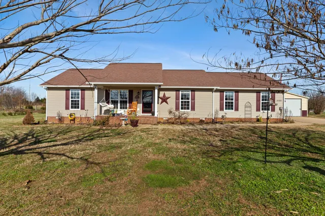 front view of a house with a small yard