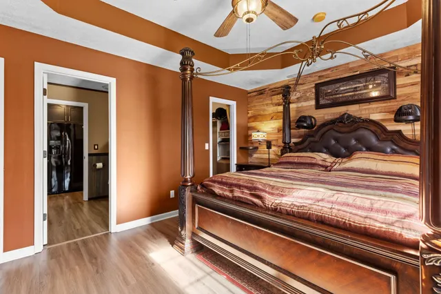 a view of room with wooden floor