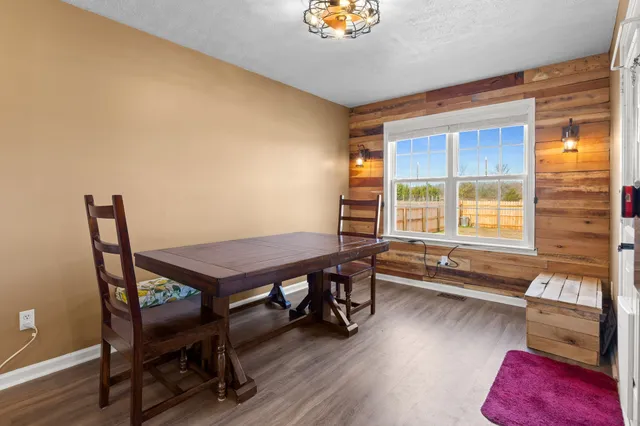 a room with furniture and a window