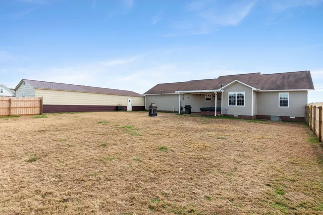a house view with a garden space