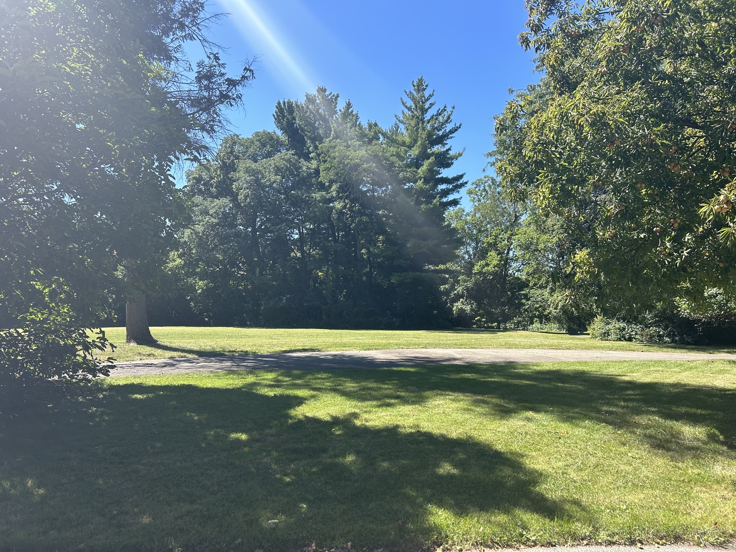 845 Appletree Lane Glenview, IL 60025 - Photo 2 of 4 a view of a swimming pool with an outdoor space and seating area