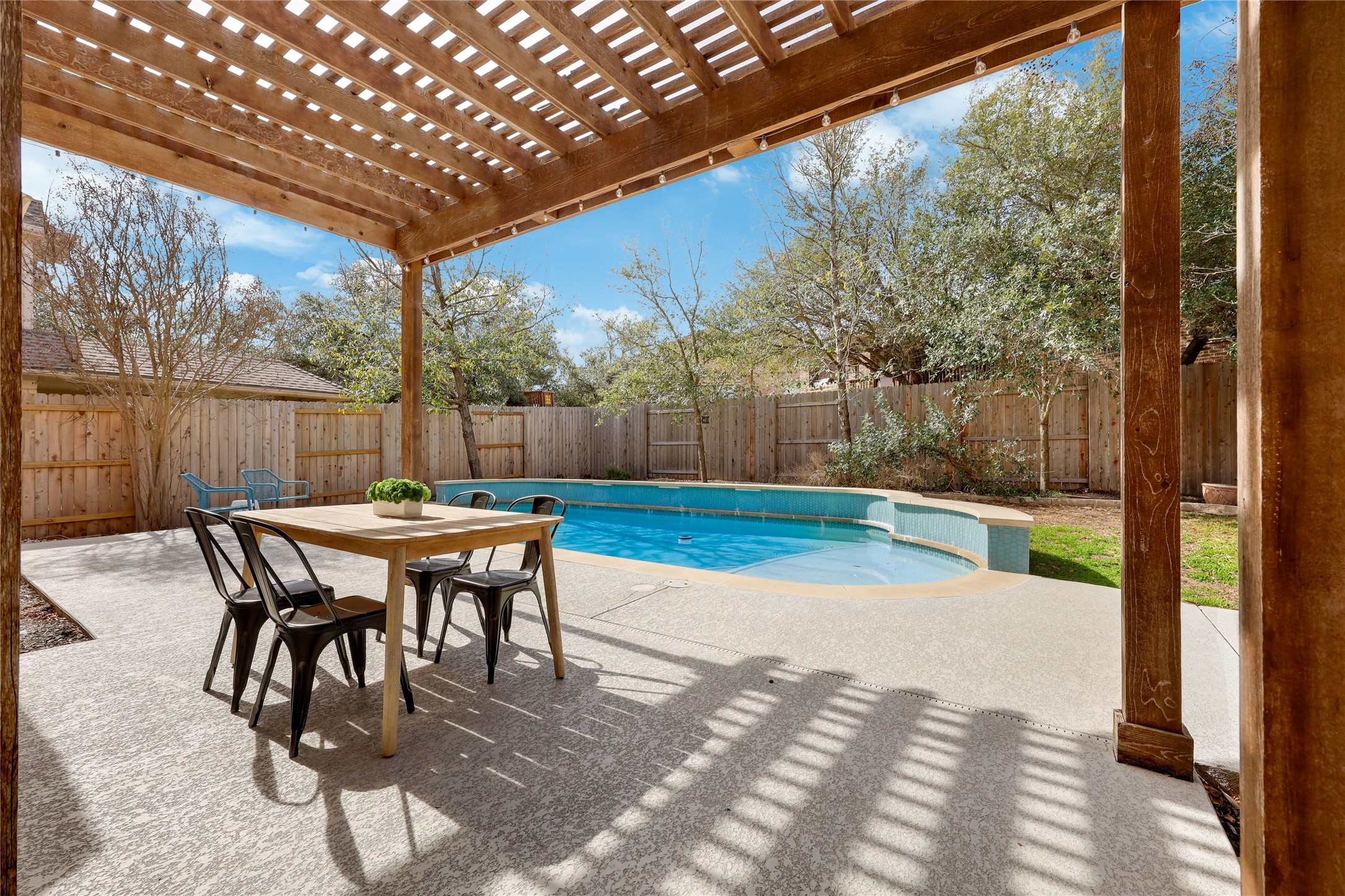7621 Menler Drive Austin, TX 78735 - Photo 9 of 40 Backyard with pool and large patio