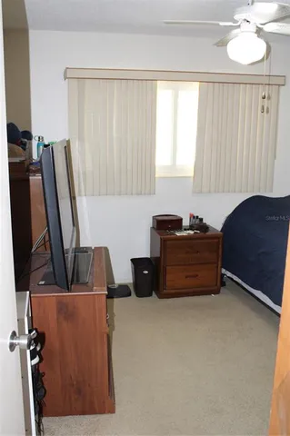 a room with a couch and a window