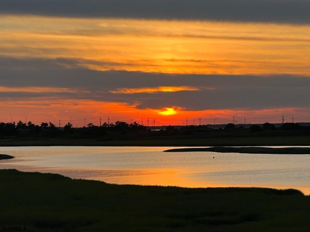 a view of ocean from sunset