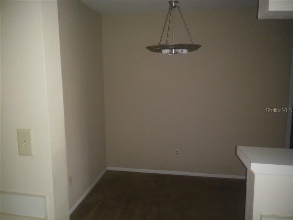 200 Afton Square, Unit 305 Altamonte Springs, FL 32714 - Photo 11 of 22 a view of a room with rack on the wall