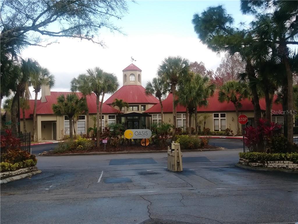 200 Afton Square, Unit 305 Altamonte Springs, FL 32714 - Photo 17 of 22 a view of a street with cars parked in front of it