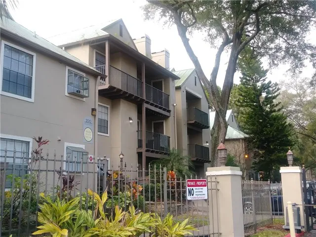 a front view of a house with parking