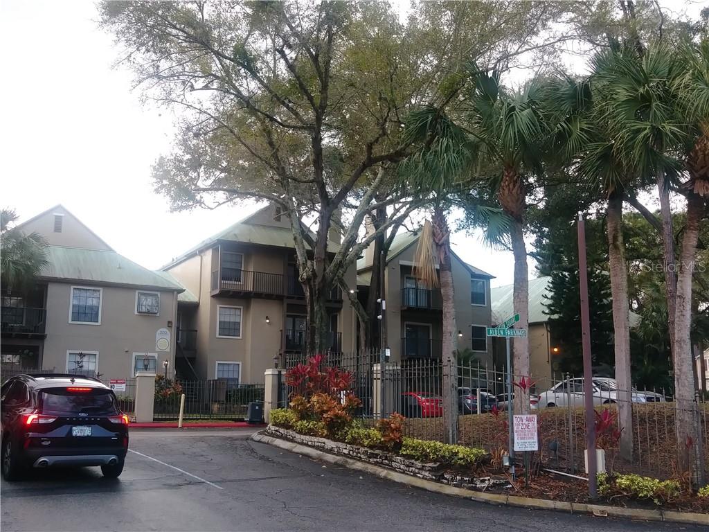 200 Afton Square, Unit 305 Altamonte Springs, FL 32714 - Photo 19 of 22 a view of a car park in front of house