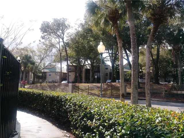 a view of a backyard of the house