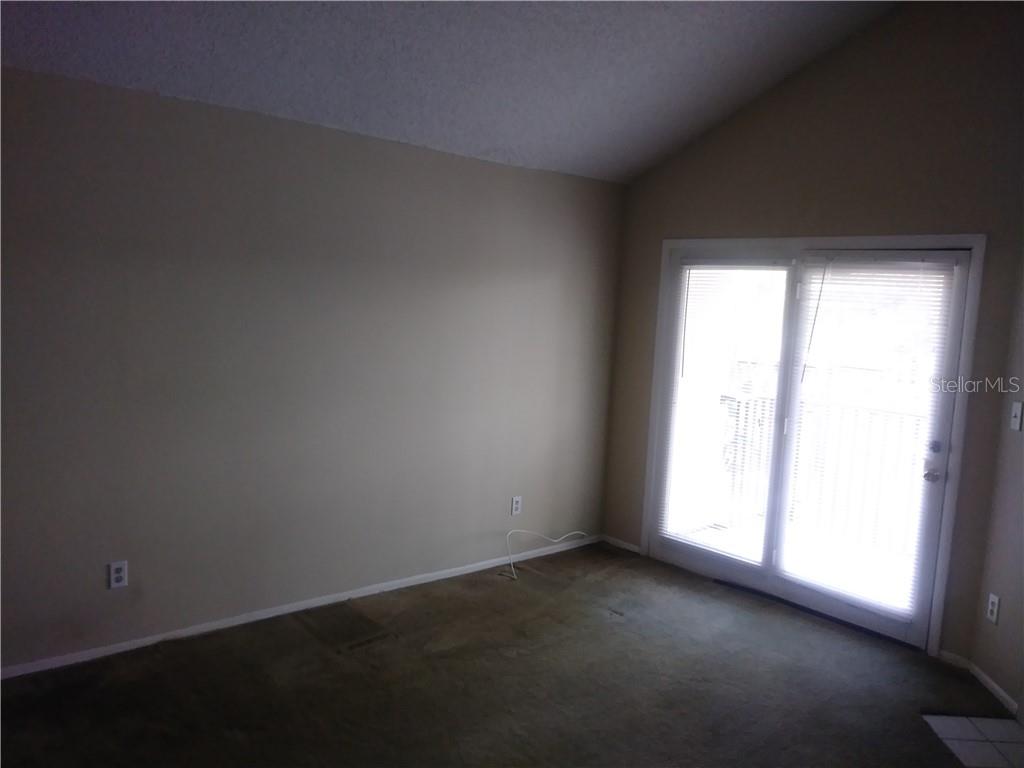 200 Afton Square, Unit 305 Altamonte Springs, FL 32714 - Photo 9 of 22 an empty room with a window