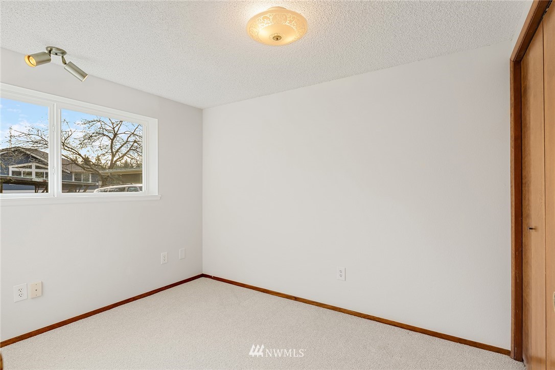 6611 Southeast 5th Place Renton, WA 98059 - Photo 22 of 25 a view of empty room with window