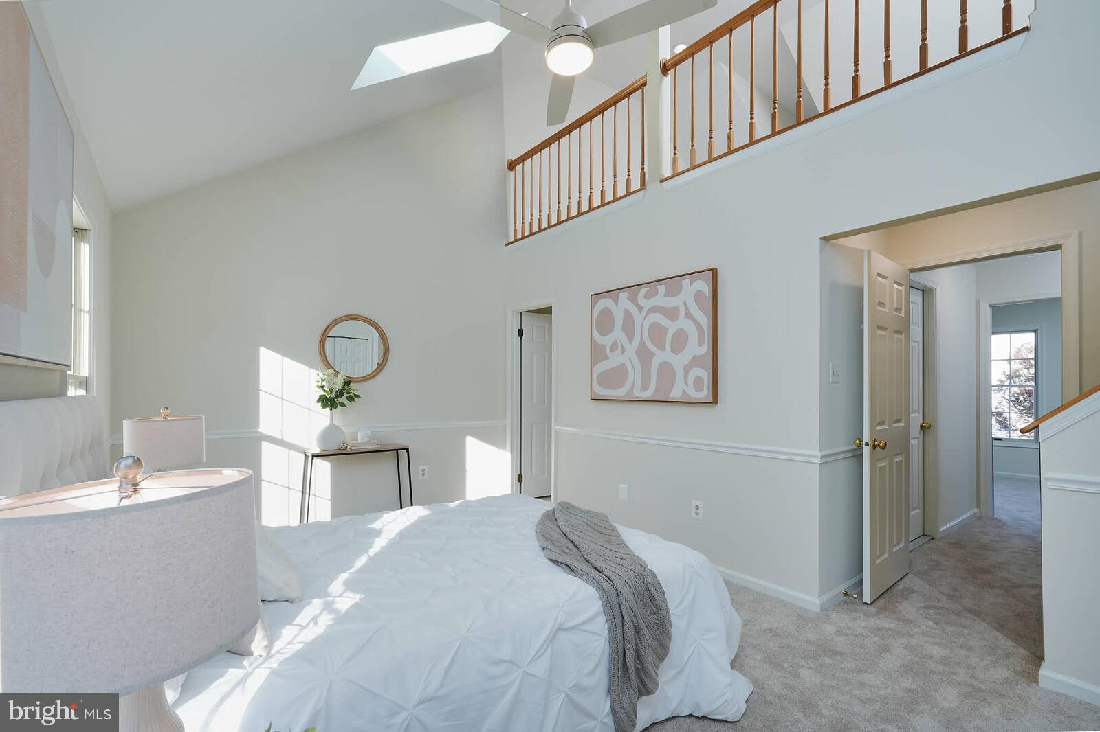 9303 Kendal Circle Laurel, MD 20723 - Photo 19 of 50 a bedroom with a bed and a chandelier