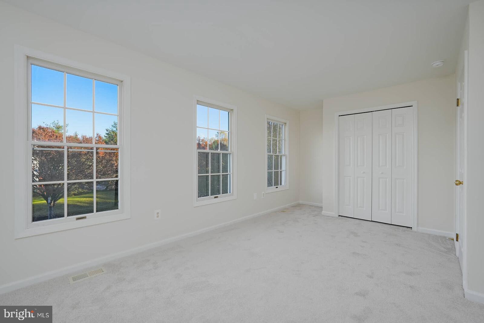 9303 Kendal Circle Laurel, MD 20723 - Photo 28 of 50 an empty room with windows