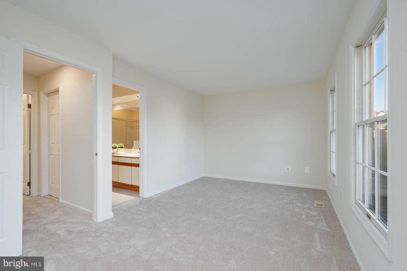 9303 Kendal Circle Laurel, MD 20723 - Photo 29 of 50 an empty room with windows