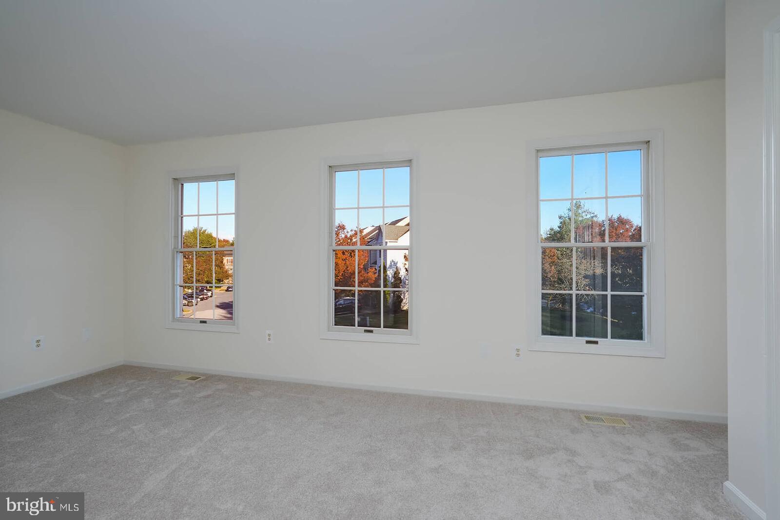 9303 Kendal Circle Laurel, MD 20723 - Photo 30 of 50 an empty room with windows