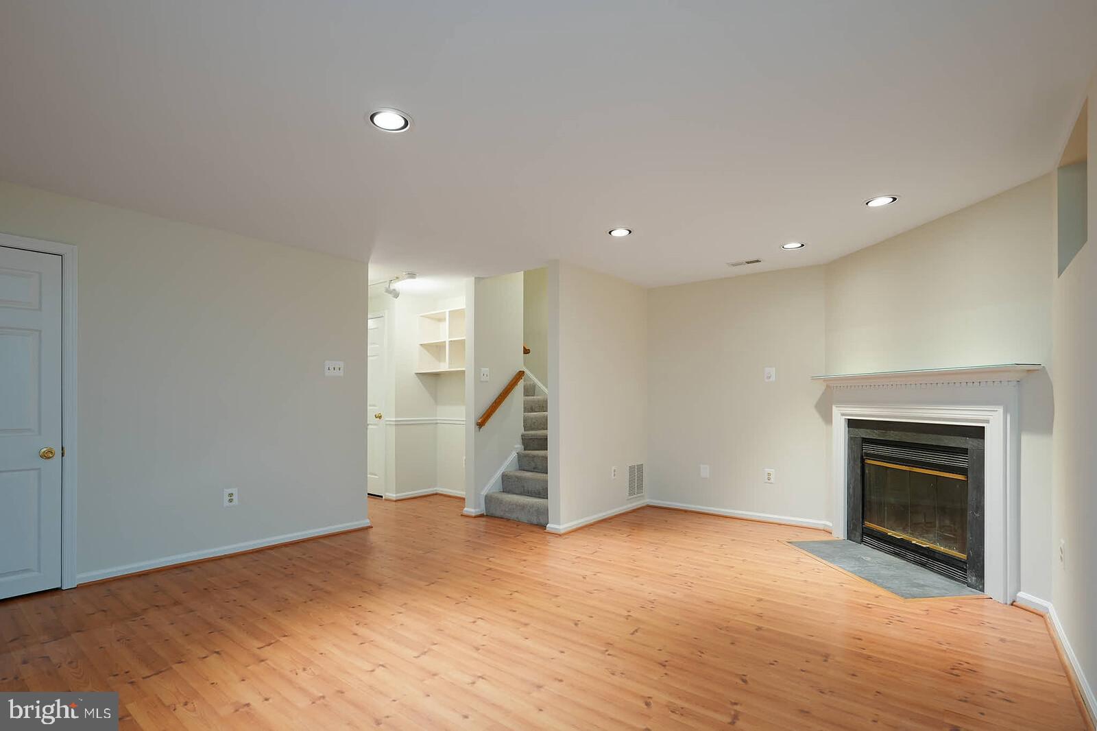 9303 Kendal Circle Laurel, MD 20723 - Photo 33 of 50 a view of empty room with a fireplace