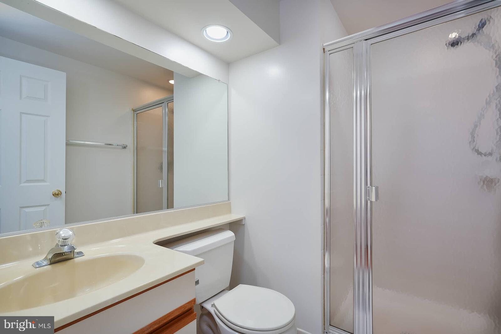 9303 Kendal Circle Laurel, MD 20723 - Photo 38 of 50 a bathroom with a sink toilet and shower