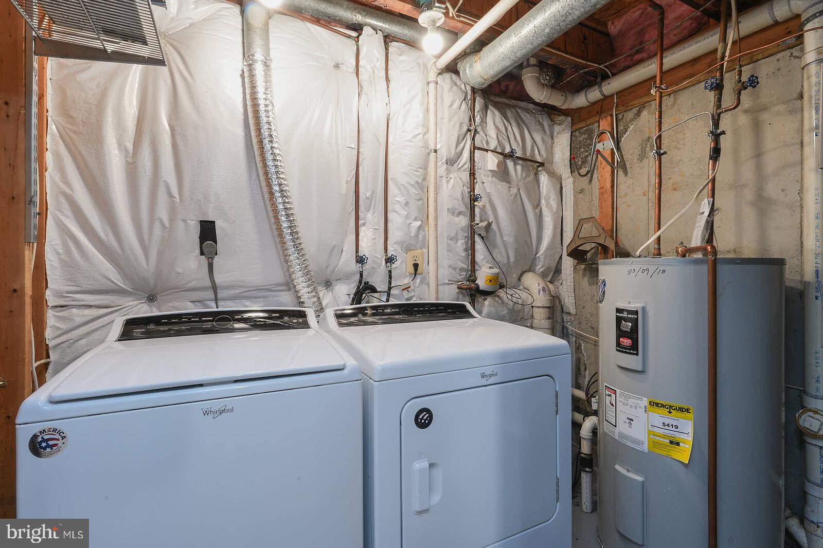 9303 Kendal Circle Laurel, MD 20723 - Photo 39 of 50 a utility room with dryer and washer