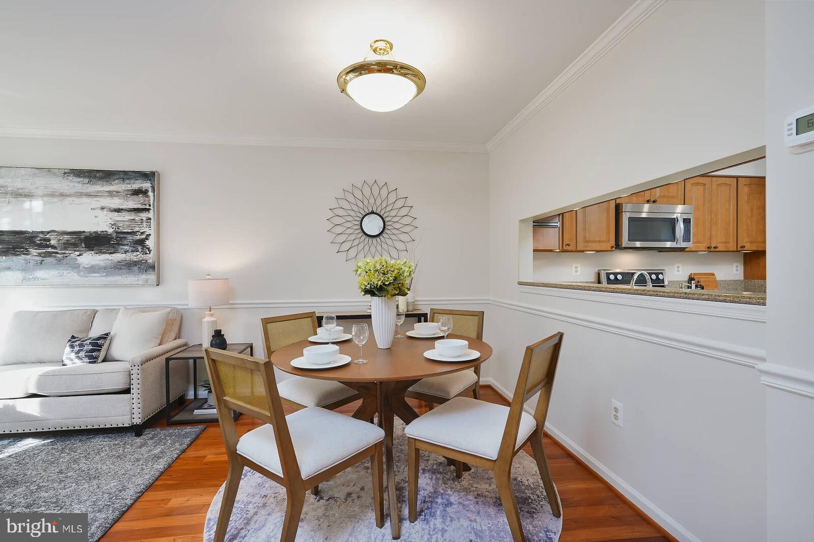 9303 Kendal Circle Laurel, MD 20723 - Photo 6 of 50 a view of a dining room with furniture