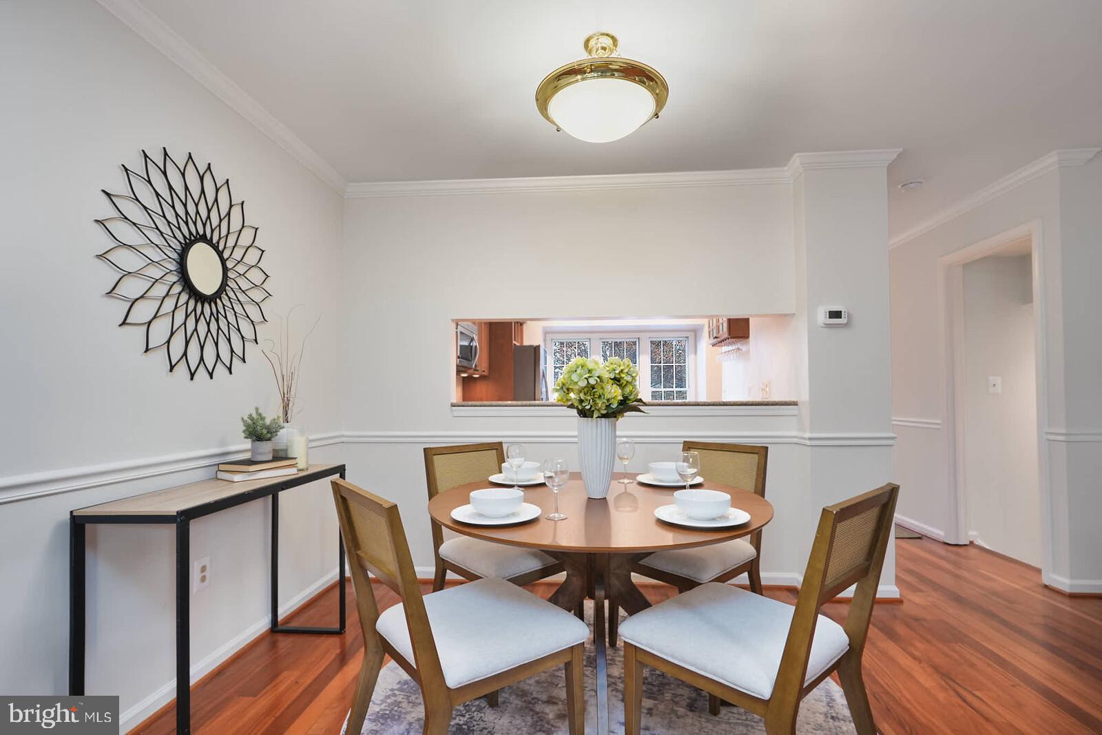 9303 Kendal Circle Laurel, MD 20723 - Photo 7 of 50 a view of a dining room with furniture and wooden floor