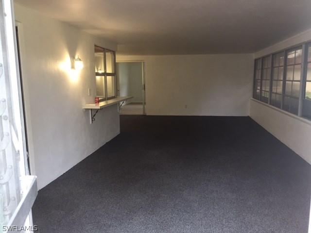 14 Kansas Road Lehigh Acres, FL 33936 - Photo 7 of 17 a view of a room with an empty space